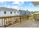 New back deck overlooking the townhome community and the sunny sky above at 3036 Arbor Ash St # 1022B, Charlotte, NC 28208
