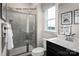 Bathroom with walk-in shower and modern vanity at 3036 Arbor Ash St # 1022B, Charlotte, NC 28208