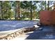 Backyard exterior of the brick home and patio, providing a private outdoor retreat at 308 N Hawthorne St, Mount Holly, NC 28120
