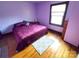 Inviting bedroom with hardwood floors and natural light at 308 N Hawthorne St, Mount Holly, NC 28120
