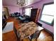 Dining area features a modern table set, chandelier, and large window at 308 N Hawthorne St, Mount Holly, NC 28120