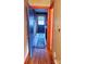 Hallway features hardwood floors and access to rooms at 308 N Hawthorne St, Mount Holly, NC 28120