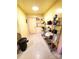 Pantry features plenty of shelving for storage at 308 N Hawthorne St, Mount Holly, NC 28120