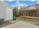 Backyard view showing a storage shed, patio, and landscaping at 3102 Windsor Trace Dr, Fort Mill, SC 29707