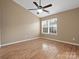 Spacious bedroom with wood floors and ceiling fan at 3102 Windsor Trace Dr, Fort Mill, SC 29707