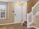 Bright entryway with staircase and wood flooring at 3102 Windsor Trace Dr, Fort Mill, SC 29707