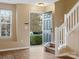 Entryway with staircase, wood floors, and neutral walls at 3102 Windsor Trace Dr, Fort Mill, SC 29707