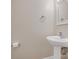 Small half bathroom with pedestal sink and mirror at 3102 Windsor Trace Dr, Fort Mill, SC 29707