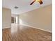Spacious living room with hardwood floors and ceiling fan at 3102 Windsor Trace Dr, Fort Mill, SC 29707