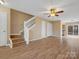 Spacious living area with hardwood floors and stairs at 3102 Windsor Trace Dr, Fort Mill, SC 29707