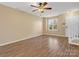 Living room with wood floors, ceiling fan and window at 3102 Windsor Trace Dr, Fort Mill, SC 29707