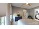 Spacious bedroom with large windows, dresser, and walk-in closet at 3238 Park Rd, Charlotte, NC 28209