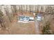 Aerial view of a mobile home with a carport and detached garage at 3535 Tines Dr, Midland, NC 28107