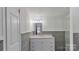 Modern bathroom with white vanity and walk-in shower at 3535 Tines Dr, Midland, NC 28107