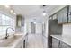 Updated kitchen, featuring stainless steel appliances and farmhouse sink at 3535 Tines Dr, Midland, NC 28107