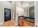 Basement bathroom with granite countertop and double doors at 3554 Gordon St, Terrell, NC 28682