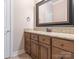 Bathroom featuring a granite countertop vanity with dark wood cabinets at 3850 Hounslow Ln, Harrisburg, NC 28075