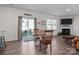 Bright dining area with sliding glass door leading to backyard at 3914 Waxahachie Ave, Charlotte, NC 28214