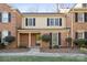 Charming two-story brick townhouse with black shutters and landscaped front yard at 4020 Ivystone Ct # B, Charlotte, NC 28277