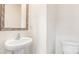 Simple bathroom with pedestal sink and toilet at 4622 Harris Elliot Rd, Lincolnton, NC 28092