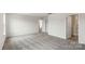 Well-lit bedroom with plush carpeting and access to a bathroom at 4622 Harris Elliot Rd, Lincolnton, NC 28092