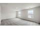 Spacious bedroom with carpet flooring and multiple windows at 4622 Harris Elliot Rd, Lincolnton, NC 28092