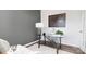 Home office with glass-top desk and gray accent wall at 4622 Harris Elliot Rd, Lincolnton, NC 28092