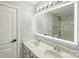 Bathroom with double sinks and illuminated mirror at 5726 Cactus Valley Rd # 238, Charlotte, NC 28277