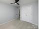Bright bedroom with ceiling fan and double door closet at 5726 Cactus Valley Rd # 238, Charlotte, NC 28277