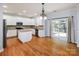 Kitchen with island, stainless steel appliances at 5726 Cactus Valley Rd # 238, Charlotte, NC 28277