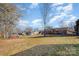 Spacious backyard with shed and partial home view at 6613 Weldon Nw Cir, Concord, NC 28027