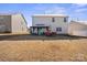 Spacious backyard with a charming patio, gazebo, and well-maintained lawn at 9142 Mackinaw Dr, Gastonia, NC 28056