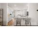 Stylish kitchen featuring gray cabinets, granite countertops, and bar seating at 9142 Mackinaw Dr, Gastonia, NC 28056