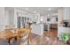 Open concept kitchen with gray cabinets, stainless appliances, and island with granite countertop at 9142 Mackinaw Dr, Gastonia, NC 28056