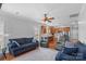 Open-concept living area with a fireplace flows seamlessly into a modern, eat-in kitchen at 1005 Jody Dr, Matthews, NC 28104