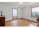 Neutral bedroom with wood floor, dresser, and lots of natural light at 101 Griffin St, Stanley, NC 28164