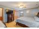 Comfortable bedroom with closet and a blue painted wall at 101 Griffin St, Stanley, NC 28164