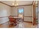 Cozy breakfast nook featuring a round wooden table and ample natural light at 101 Griffin St, Stanley, NC 28164