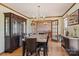 Formal dining room featuring a large table, hardwood floors, and classic decor at 101 Griffin St, Stanley, NC 28164