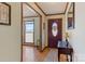 Inviting foyer with hardwood floors, an ornate front door, and warm lighting at 101 Griffin St, Stanley, NC 28164