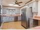 Spacious kitchen featuring stainless steel appliances, a double sink, and ample cabinetry at 101 Griffin St, Stanley, NC 28164