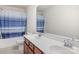 Bathroom with double vanity, bathtub, and shower at 10422 Ebbets Rd, Charlotte, NC 28273