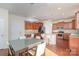 Kitchen with island, breakfast bar, and stainless steel appliances at 10422 Ebbets Rd, Charlotte, NC 28273