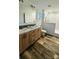 Bathroom featuring a dual vanity, wood cabinets, and a luxurious glass-enclosed shower at 118 Valley Springs Dr, Olin, NC 28660