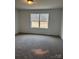 Bright bedroom featuring neutral walls and carpet at 118 Valley Springs Dr, Olin, NC 28660