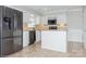 Well-equipped kitchen featuring stainless steel appliances and a peninsula counter space at 11828 Mirror Lake Dr, Charlotte, NC 28226