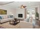 Comfortable living room featuring neutral furniture and a decorative fireplace at 11828 Mirror Lake Dr, Charlotte, NC 28226