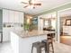 Kitchen boasts a large island with seating and granite countertops at 1204 Allenbrook Dr, Charlotte, NC 28208