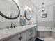 Elegant bathroom with double vanity, soaking tub, and shower at 12434 Kemerton Ln, Huntersville, NC 28078