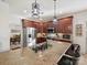 Modern kitchen with granite countertops, stainless steel appliances, and custom cabinetry at 12434 Kemerton Ln, Huntersville, NC 28078